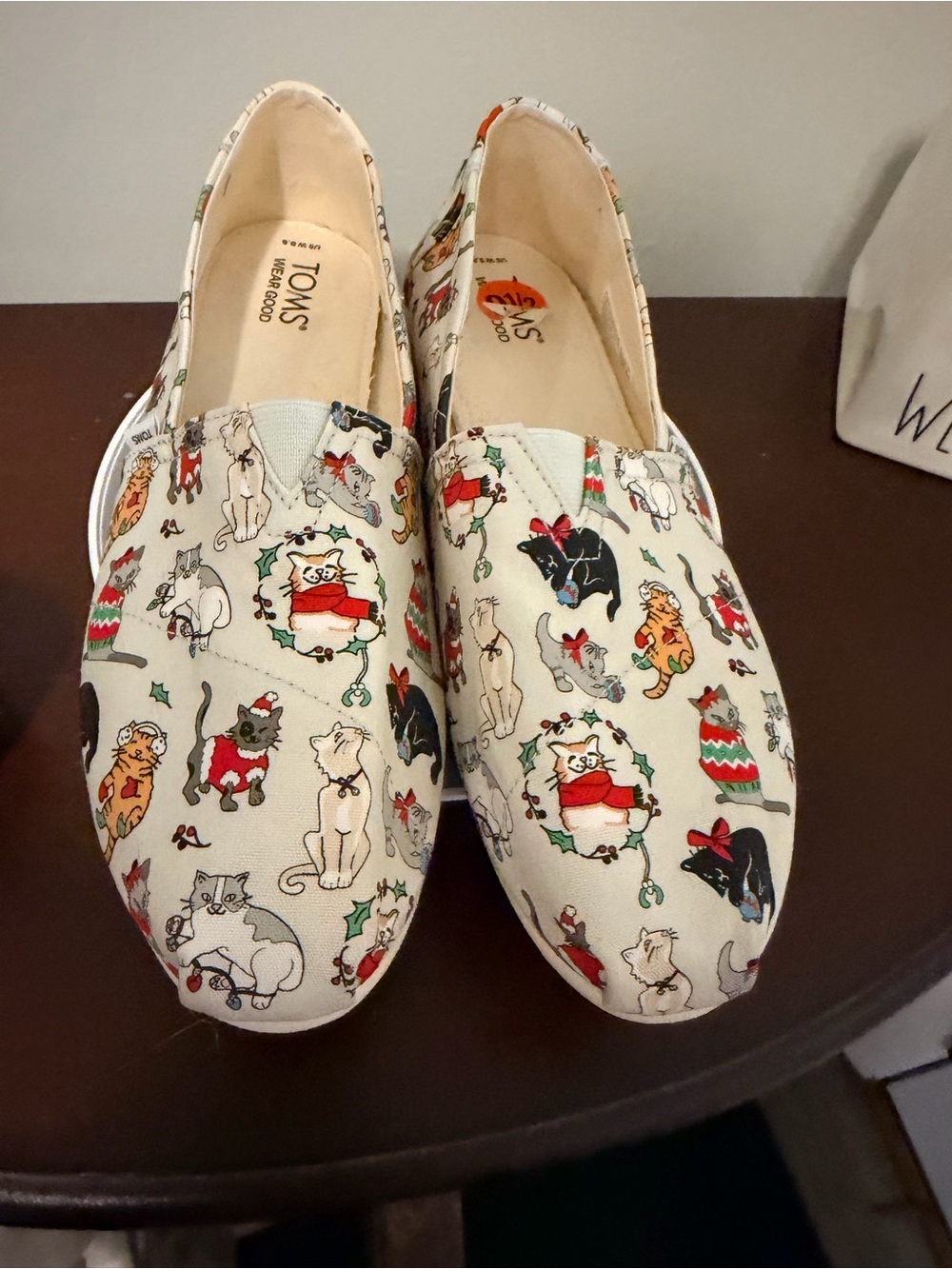 Toms Women's Cream Slip-On Shoes with Multicolor Holiday Cat Print